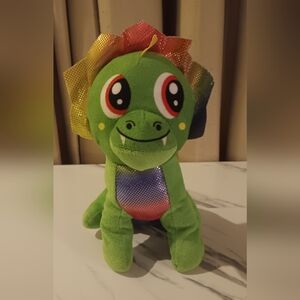 Green Dinosaur Plush Toy with Rainbow Accents